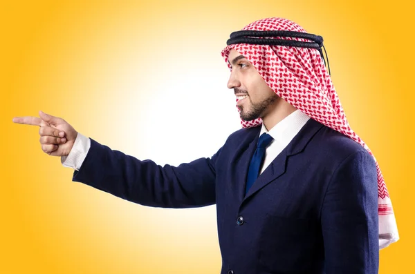 Arab businessman pointing finger — Stock Photo, Image