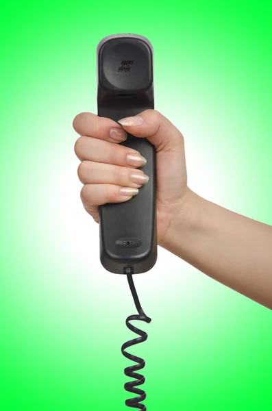 Hand met telefoon — Stockfoto