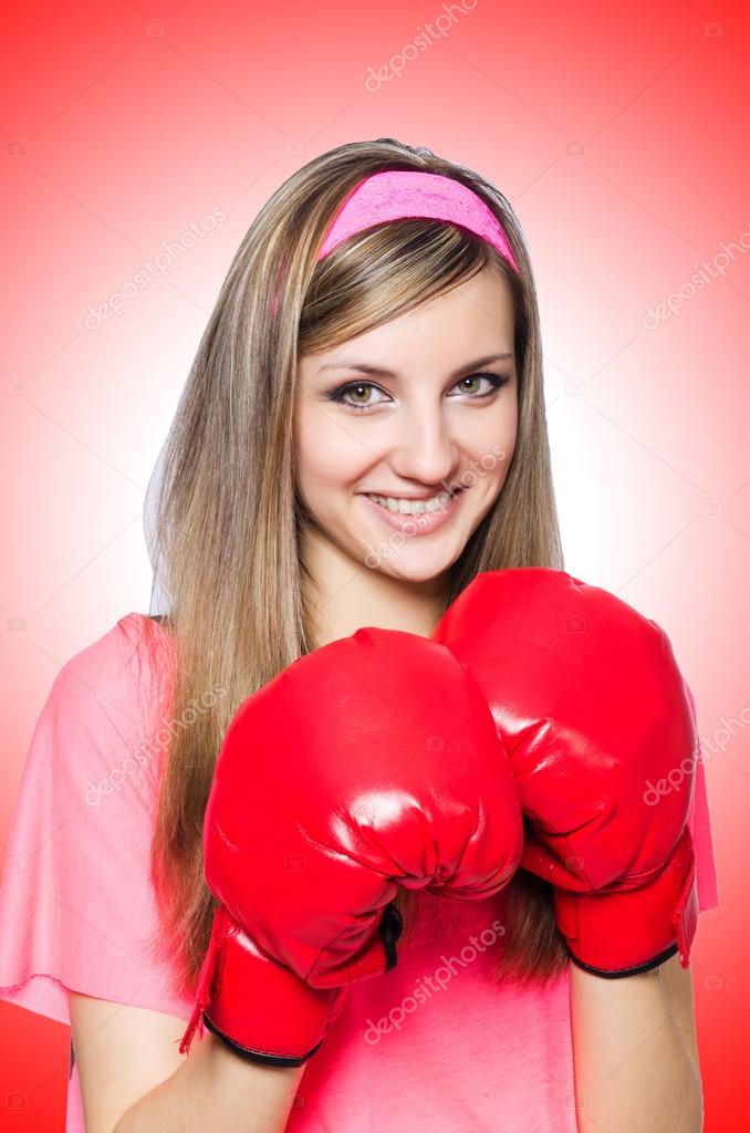 Young lady with boxing gloves — Stock Photo © Elnur_ 59657217