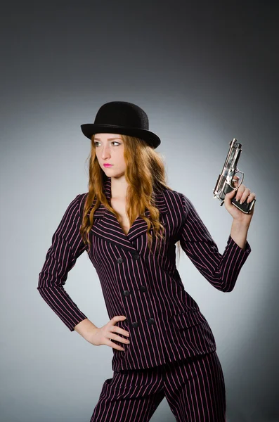 Woman gangster with gun in vintage concept — Stock Photo, Image