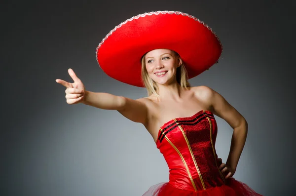 Woman wearing sombrero hat in funny concept — Stock Photo, Image