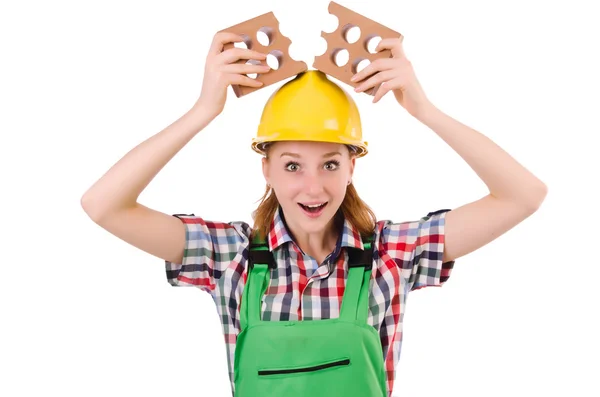 Woman with bricks isolated on white — Stock Photo, Image