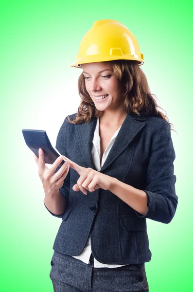 Female builder with calculator — Stock Photo, Image