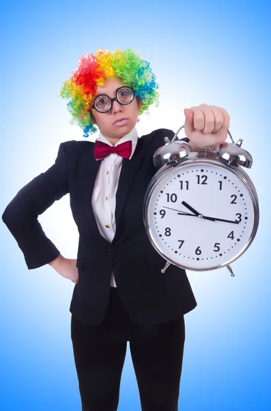 Funny clown with clock — Stock Photo, Image