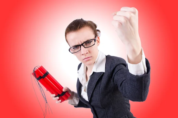 Businesswoman with dynamite on white — Stock Photo, Image