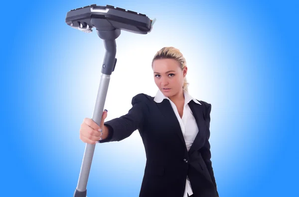 Businesswoman with vacuum cleaner — Stock Photo, Image