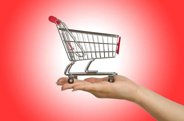 Shopping trolley on white — Stock Photo, Image