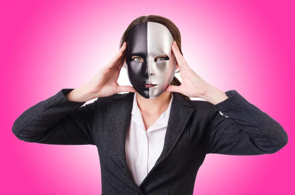 Kvinde med maske i hykleri koncept - Stock-foto