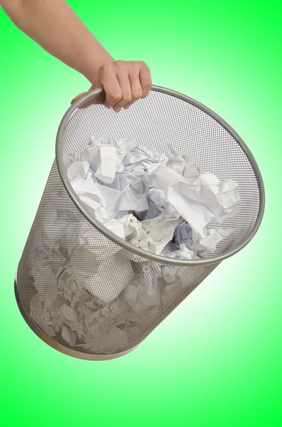 Hands with garbage bin with paper — Stock Photo, Image