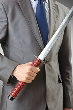 beyaz üzerine kılıç ile işadamı