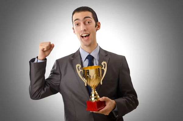 Man being awarded with golden cup — Stock Photo, Image