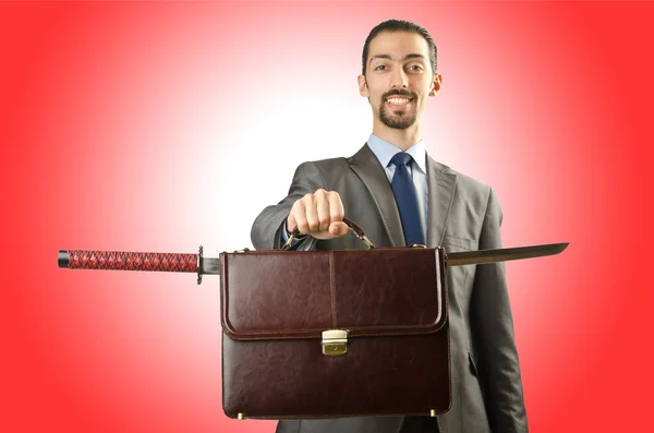 Businessman with sword — Stock Photo, Image