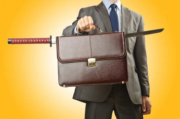 Businessman with sword on white — Stock Photo, Image