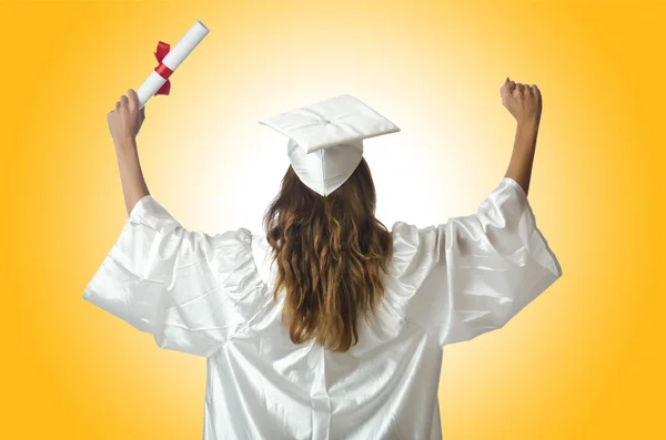 Giovane studente con diploma su bianco — Foto Stock