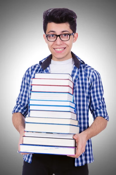 Student with lots of books — Stockfoto