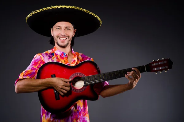 Man wearing sombrero with guitar — Stock Photo, Image