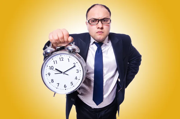 Businessman with clock — Stock Photo, Image