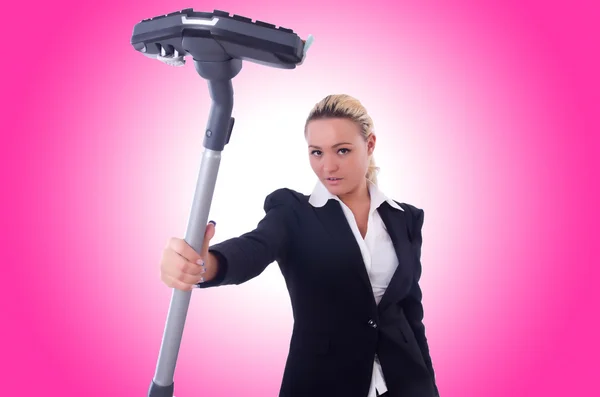 Businesswoman with vacuum cleaner — Stock Photo, Image