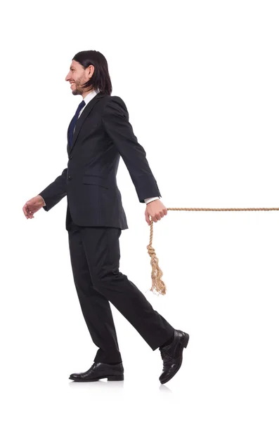 Молодий бізнесмен тягне мотузку ізольовано на білому — стокове фото