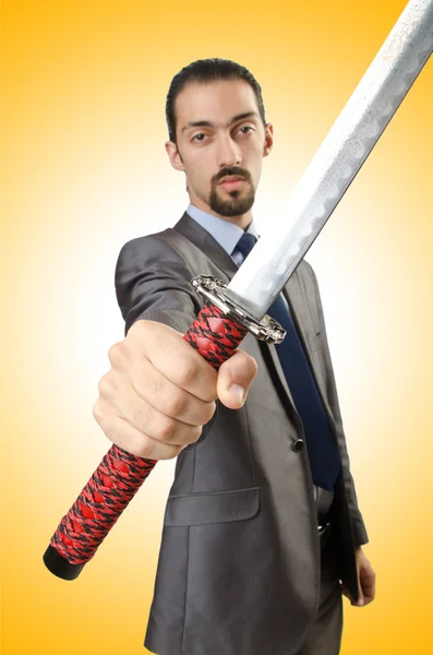 Business man with sword — Stock Photo, Image