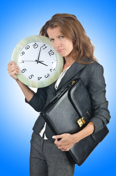 Young Businesswoman with clock — Stock Photo, Image