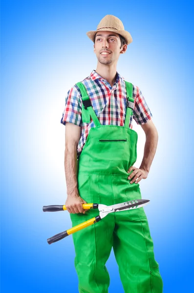 Jardineiro homem com tesouras — Fotografia de Stock