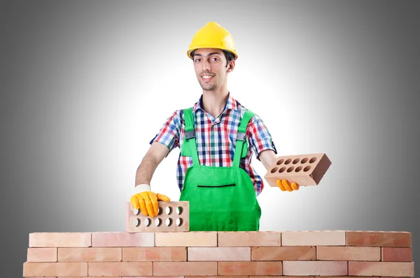 Builder med hjälm — Stockfoto