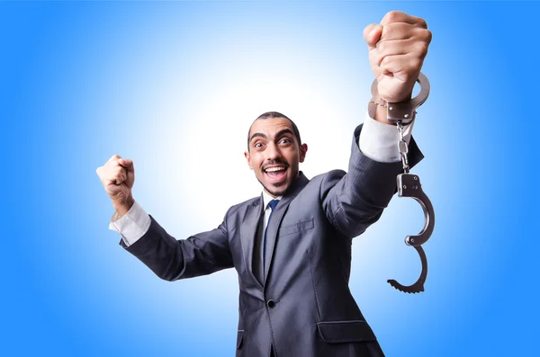 Funny businessman with handcuffs — Stock Photo, Image