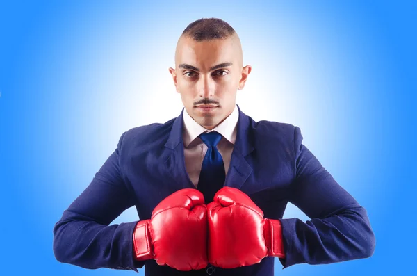 Bonito homem de negócios com luvas de boxe — Fotografia de Stock