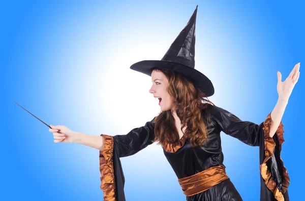 Beautiful Witch with wand — Stock Photo, Image