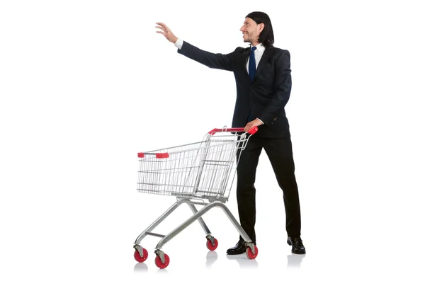 Uomo shopping con carrello supermercato isolato su bianco — Foto Stock