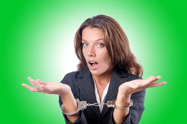 Female businesswoman with handcuffs — Stock Photo, Image