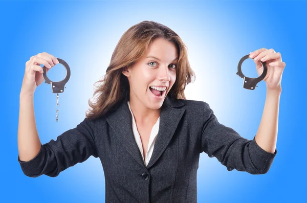 Female businesswoman with handcuffs — Stock Photo, Image