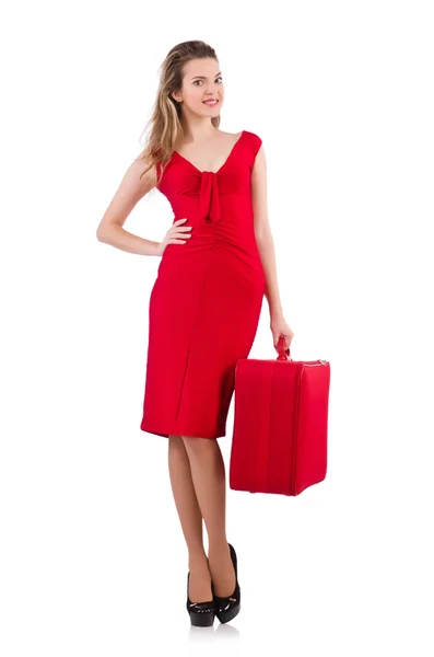 Woman in red dress and travel case — Stock Photo, Image