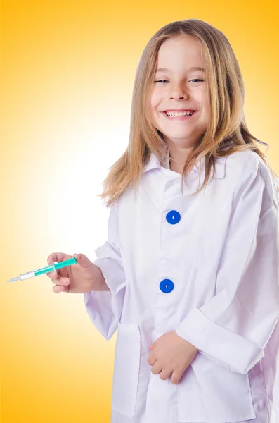 Little doctor with syringe — Stock Photo, Image