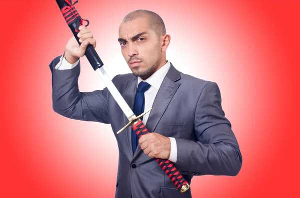 Geschäftsmann mit Schwert — Stockfoto