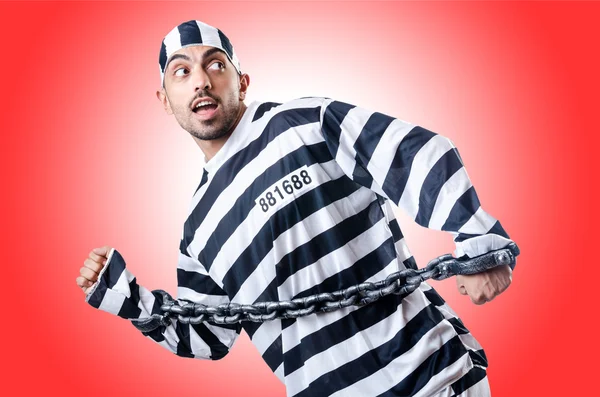 Convict criminal in striped uniform — Stock Photo, Image