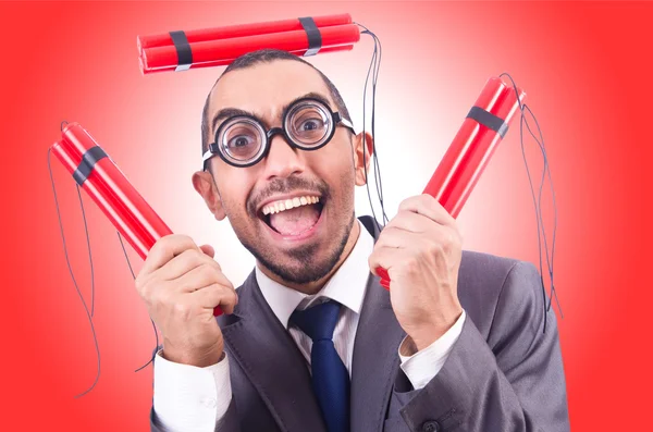 Businessman with red dynamite — Stock Photo, Image