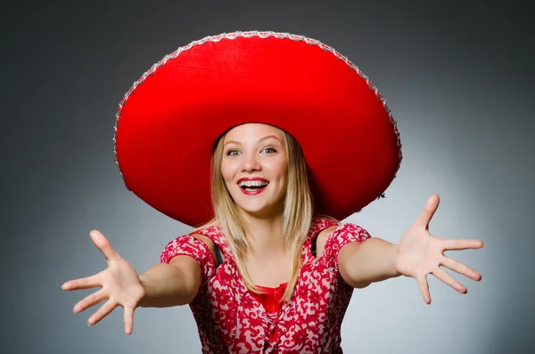Woman wearing sombrero hat — Stock Photo, Image