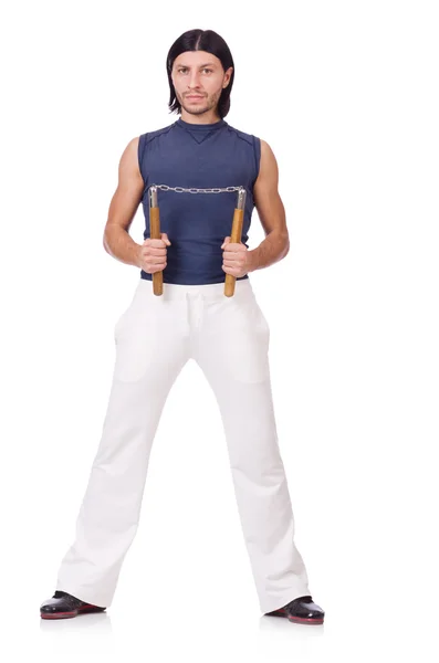 Funny karate fighter with nunchucks on white — Stock Photo, Image