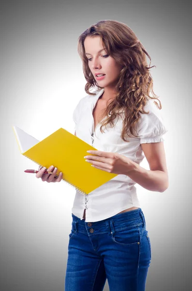 Young student on gray — Stock Photo, Image