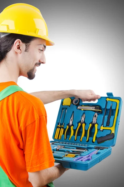 Repairman in coveralls in industrial Royalty Free Stock Photos