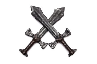 Medieaval swords isolated on the white clipart