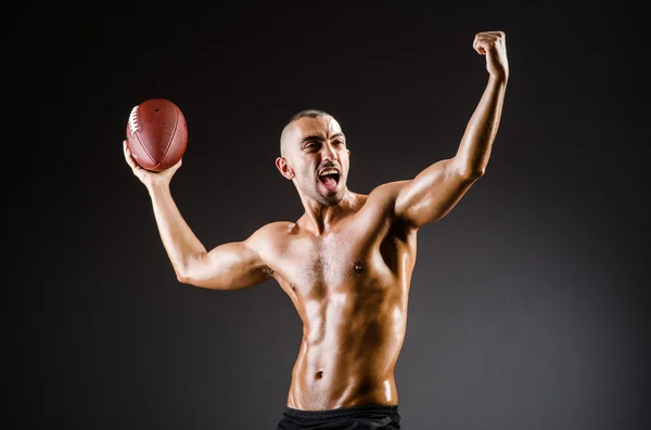 Jogador de futebol muscular — Fotografia de Stock