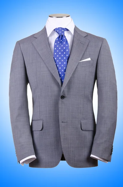 Grey Jacket  on blue — Stock Photo, Image