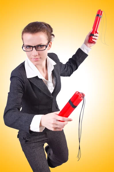 Businesswoman with dynamite — Stock Photo, Image