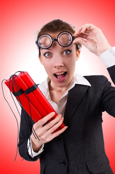 Businesswoman with dynamite — Stock Photo, Image