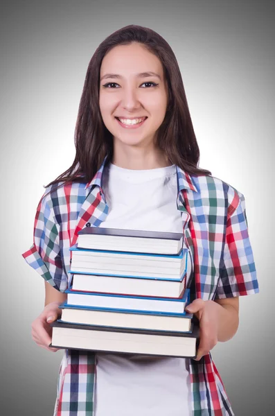 Student girl with many books — Stock Photo, Image