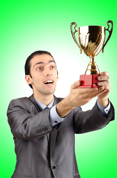 Homem sendo premiado com copo — Fotografia de Stock