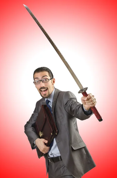 Successful affärsman med svärd — Stockfoto